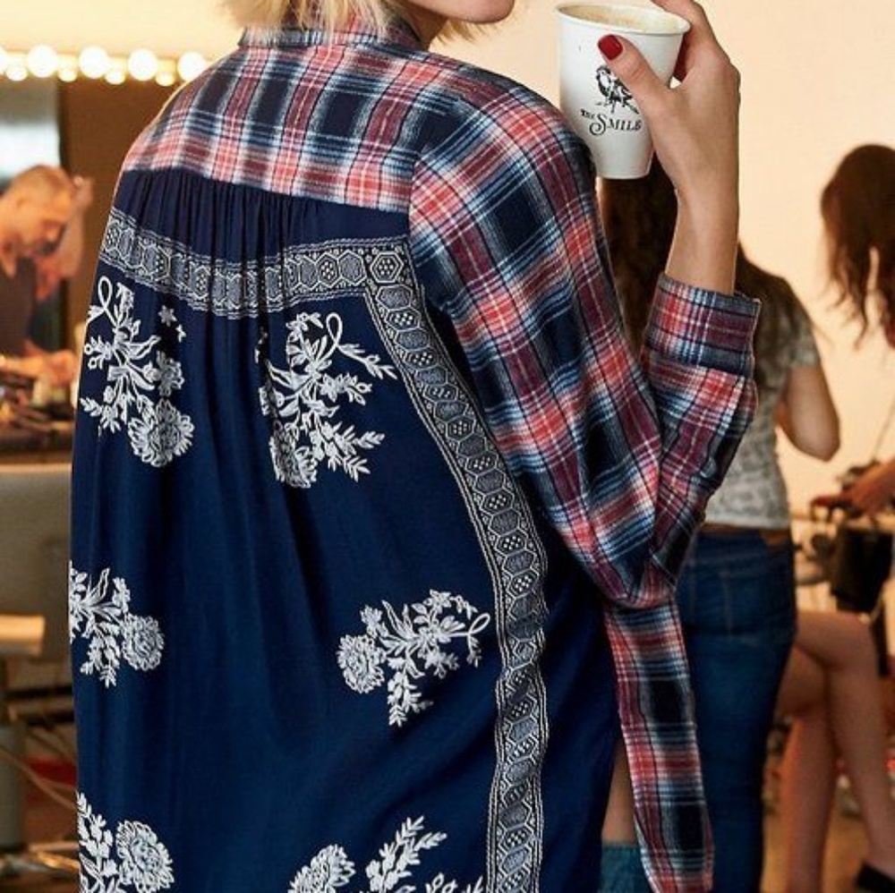 Free people behind the flannel button down